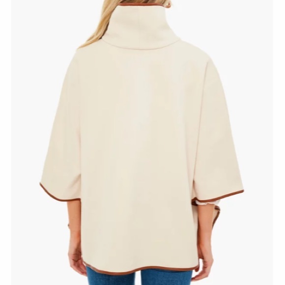 Ivory Pearl Leather Trim Funnel Neck Piper Poncho
TUCKERNUCK - Picture 4 of 8